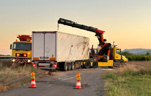 Hawkins Towing Truck at Commercial Ground Performing Heavy Duty Recovery in Greenville, SC
